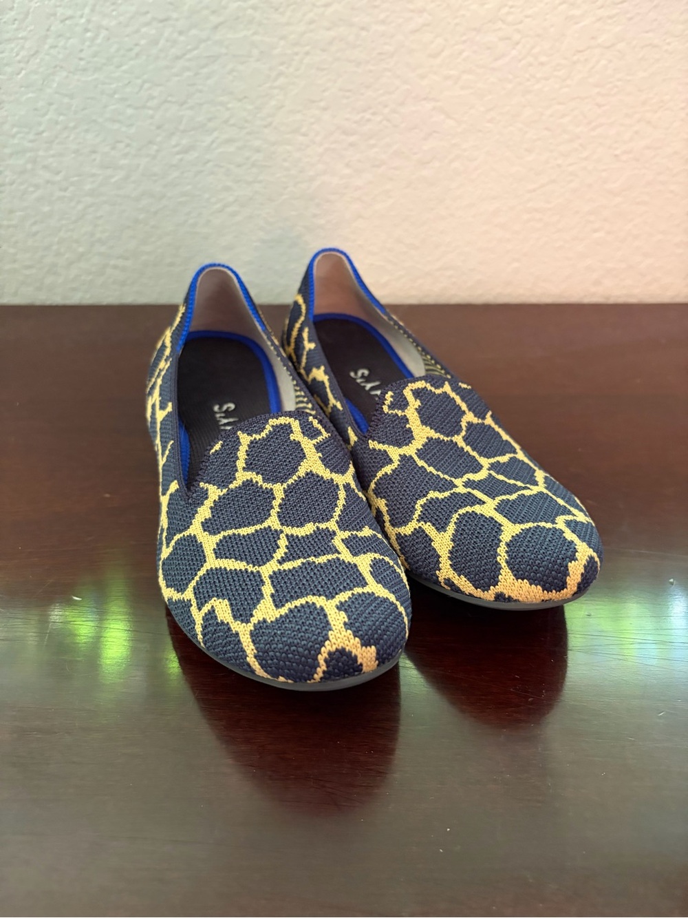 Rothy's Navy Slip-On Loafers with Giraffe Pattern